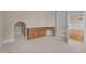 Spacious office featuring a built-in desk, carpet, and natural lighting at 104 Dallavia Ct, Morrisville, NC 27560