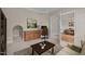 Well-lit office featuring a built-in desk area, decorative painting, and ample space at 104 Dallavia Ct, Morrisville, NC 27560