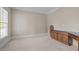 Neutral tone office with built-in desk space and carpeting at 104 Dallavia Ct, Morrisville, NC 27560