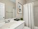Bathroom featuring a white vanity, mirror, shower with a patterned curtain, and neutral wall paint at 109 Homegate Cir, Apex, NC 27502