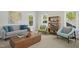 Bright and airy living room with modern furniture, hardwood floors, and lots of natural light from large windows at 109 Homegate Cir, Apex, NC 27502