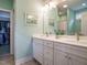 Bathroom boasts a double vanity, ample counter space, and decorative accents at 110 Streamside Dr, Sanford, NC 27330