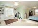Large bedroom with custom built-ins, a window seat, and carpeted floors at 110 Streamside Dr, Sanford, NC 27330