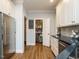 Kitchen has stainless steel appliances, pantry, and granite countertops at 110 Streamside Dr, Sanford, NC 27330