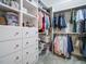 A well-organized walk-in closet with shelves, drawers, and hanging space at 110 Streamside Dr, Sanford, NC 27330
