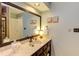 Bathroom with vanity and a large framed mirror at 111 Fox View Pl, Cary, NC 27511