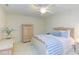 Comfortable bedroom with white carpet and wicker furniture for relaxed living at 111 Fox View Pl, Cary, NC 27511