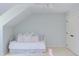 Bedroom featuring vaulted ceiling, twin bed, and single bed at 111 Fox View Pl, Cary, NC 27511