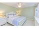 Bedroom featuring neutral carpet, white trim, and classic white furnishings at 111 Fox View Pl, Cary, NC 27511