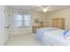 Bright bedroom with natural light and wicker furnishings offers a cozy retreat at 111 Fox View Pl, Cary, NC 27511
