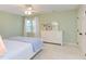 Bedroom featuring neutral carpet, white trim, and complementary accents at 111 Fox View Pl, Cary, NC 27511