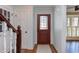 Cozy entryway featuring a stained glass front door and hardwood floors at 111 Fox View Pl, Cary, NC 27511