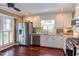 Bright kitchen with stainless steel appliances and white cabinets at 111 Fox View Pl, Cary, NC 27511