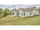 Spacious backyard with a black fence and lush green lawn at 1112 Addington Lake Ln, Knightdale, NC 27545