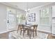 Cozy dining area with natural light and stylish decor at 1112 Addington Lake Ln, Knightdale, NC 27545