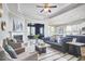 Bright living room with fireplace, comfortable seating, and an open layout at 1112 Addington Lake Ln, Knightdale, NC 27545