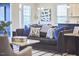 Comfortable living room with neutral colors, stylish furniture, and modern decor at 1112 Addington Lake Ln, Knightdale, NC 27545