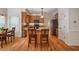 Open kitchen featuring granite countertops, stainless steel appliances, and a central island at 113 Glenmore Rd, Chapel Hill, NC 27516