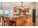Bright, open kitchen with granite countertops, stainless appliances, and a center island at 113 Glenmore Rd, Chapel Hill, NC 27516