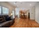 Open floor plan featuring hardwood floors, and a seamless flow into the kitchen and dining areas at 113 Glenmore Rd, Chapel Hill, NC 27516