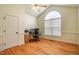 Large office with hardwood floors, and large window with natural light at 113 Glenmore Rd, Chapel Hill, NC 27516