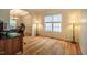 Bright home office with hardwood floors and views from a large window at 113 Glenmore Rd, Chapel Hill, NC 27516