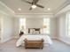 Spacious main bedroom with large windows and carpet floors at 113 Tower Ridge Ln, Sanford, NC 27330