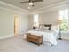 Spacious main bedroom with large windows and carpet floors at 113 Tower Ridge Ln, Sanford, NC 27330