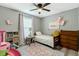 Bright bedroom with a ceiling fan at 114 Carriage Hill Dr, Stem, NC 27581