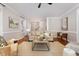 Comfortable living room with neutral tones, a fireplace, and an open floor plan at 120 Cypress View Way, Apex, NC 27502