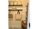 Mudroom with decorative floor tile, baskets, and shelving at 120 Cypress View Way, Apex, NC 27502