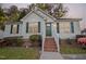 Charming single-story home with a welcoming front porch and well-maintained landscaping at 1204 Amberstone Dr, Knightdale, NC 27545
