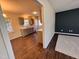 Open-concept living area connects seamlessly to the kitchen, enhanced by hardwood flooring at 1204 Amberstone Dr, Knightdale, NC 27545