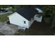 Rear exterior featuring a well-maintained backyard, patio, and convenient access to parking at 1204 Amberstone Dr, Knightdale, NC 27545