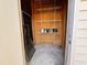 The shed interior shows empty shelves ready for storage at 1204 Amberstone Dr, Knightdale, NC 27545