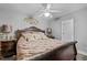 Bedroom featuring wooden furniture, ceiling fan and carpeted floors at 123 Ariel St, Lillington, NC 27546