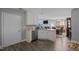 Open concept kitchen with stainless steel dishwasher and modern cabinets at 123 Ariel St, Lillington, NC 27546
