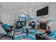 Elegant living room showcasing vaulted ceilings, a fireplace, stylish decor, and comfortable leather seating at 123 Ariel St, Lillington, NC 27546