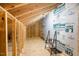 Unfinished attic space showing framing and Dryline weather barrier; ready for customization at 149 Logbridge Rd, Chapel Hill, NC 27516