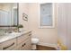 Bathroom featuring a modern sink, fixtures, and natural light at 149 Logbridge Rd, Chapel Hill, NC 27516