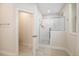 Clean, modern bathroom with glass enclosed shower and neutral color palette at 149 Logbridge Rd, Chapel Hill, NC 27516