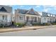 Charming home featuring a cozy front porch and stone accents, set in a welcoming neighborhood at 149 Logbridge Rd, Chapel Hill, NC 27516