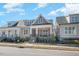 Charming home featuring a cozy front porch and stone accents, set in a welcoming neighborhood at 149 Logbridge Rd, Chapel Hill, NC 27516