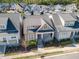 Aerial shot of a charming home with landscaped front yard and a welcoming front porch at 149 Logbridge Rd, Chapel Hill, NC 27516