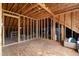 Unfinished attic space framed with wood beams, presenting an opportunity for customization at 1500 Antioch Rd, Rocky Mount, NC 27801