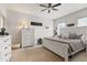 Bedroom with a soft color palette, plush carpeting, and abundant closet space at 1500 Antioch Rd, Rocky Mount, NC 27801
