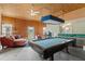 Spacious bonus room with a pool table, perfect for recreation and entertainment at 1500 Antioch Rd, Rocky Mount, NC 27801