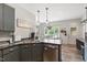 Kitchen shows stainless steel appliances, breakfast nook, and plenty of natural light at 1500 Antioch Rd, Rocky Mount, NC 27801