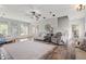 Bright living room with hardwood floors, comfortable seating, and a view of the backyard at 1500 Antioch Rd, Rocky Mount, NC 27801