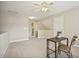 Spacious bedroom with neutral walls and carpet, ideal for a versatile living or working area at 1515 Poets Glade Dr, Apex, NC 27523